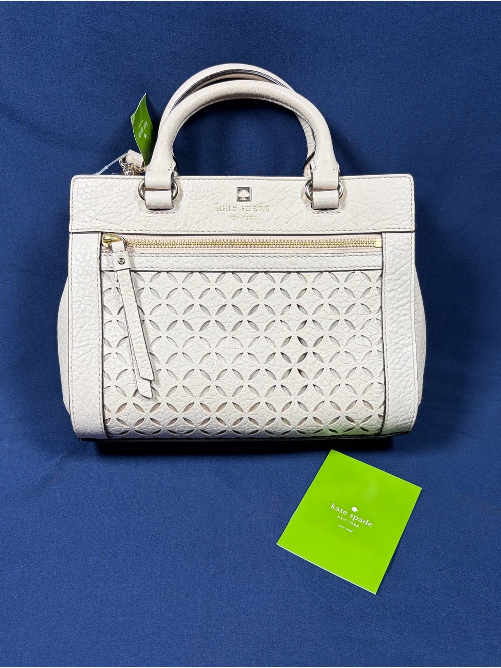 Kate Spade Perri Lane pebbled leather in laser cut geometric floral overlay NWT